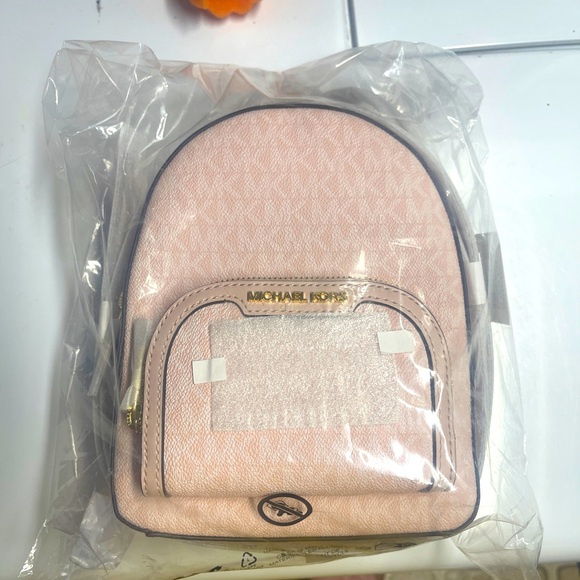 NWT Michael Kors Jaycee Mini Backpack Lt. Powder Blush XS Pink Logo 3" x 7" X 9" - Picture 1 of 6